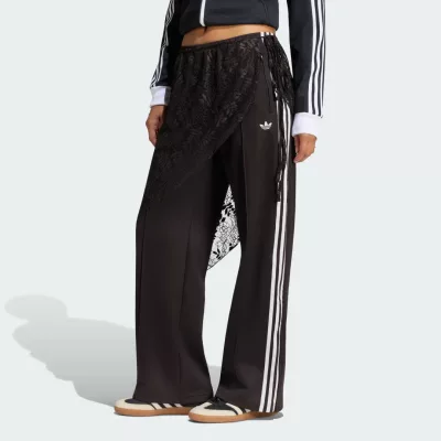 Adidas Spodnie dresowe 2W1 Firebird Loose z koronkową spódnicą